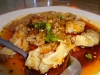 Pork won tons in chile oil