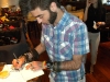 Iacopo signs an autograph