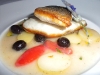 Branzino with campari tomatoes, Taggiasca olives and Vermentino veloute