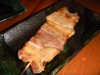 Tough, unseasoned pork belly
